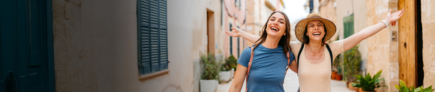 2 women walking in the street