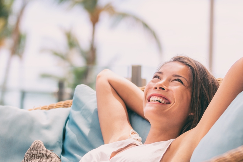Smiling young woman on vacation